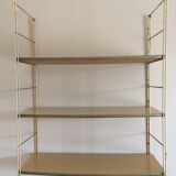 String shelf with wooden trays and formica