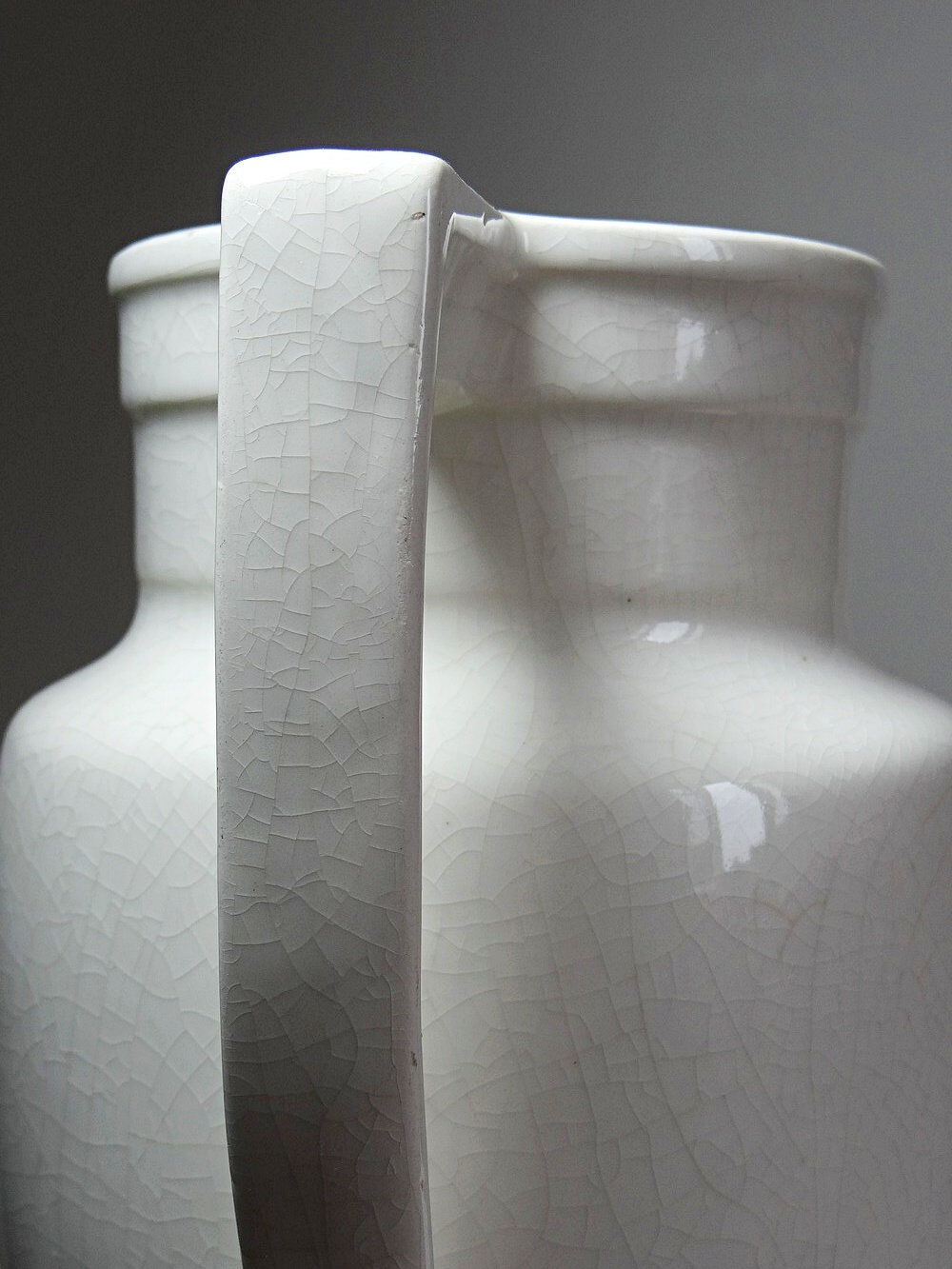 Large Art Deco toilet bowl, antique cracked faience.