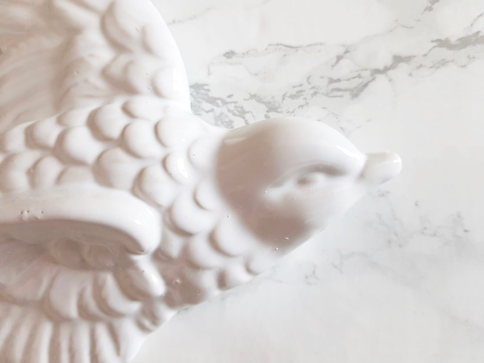 Set of three swallows in white earthenware