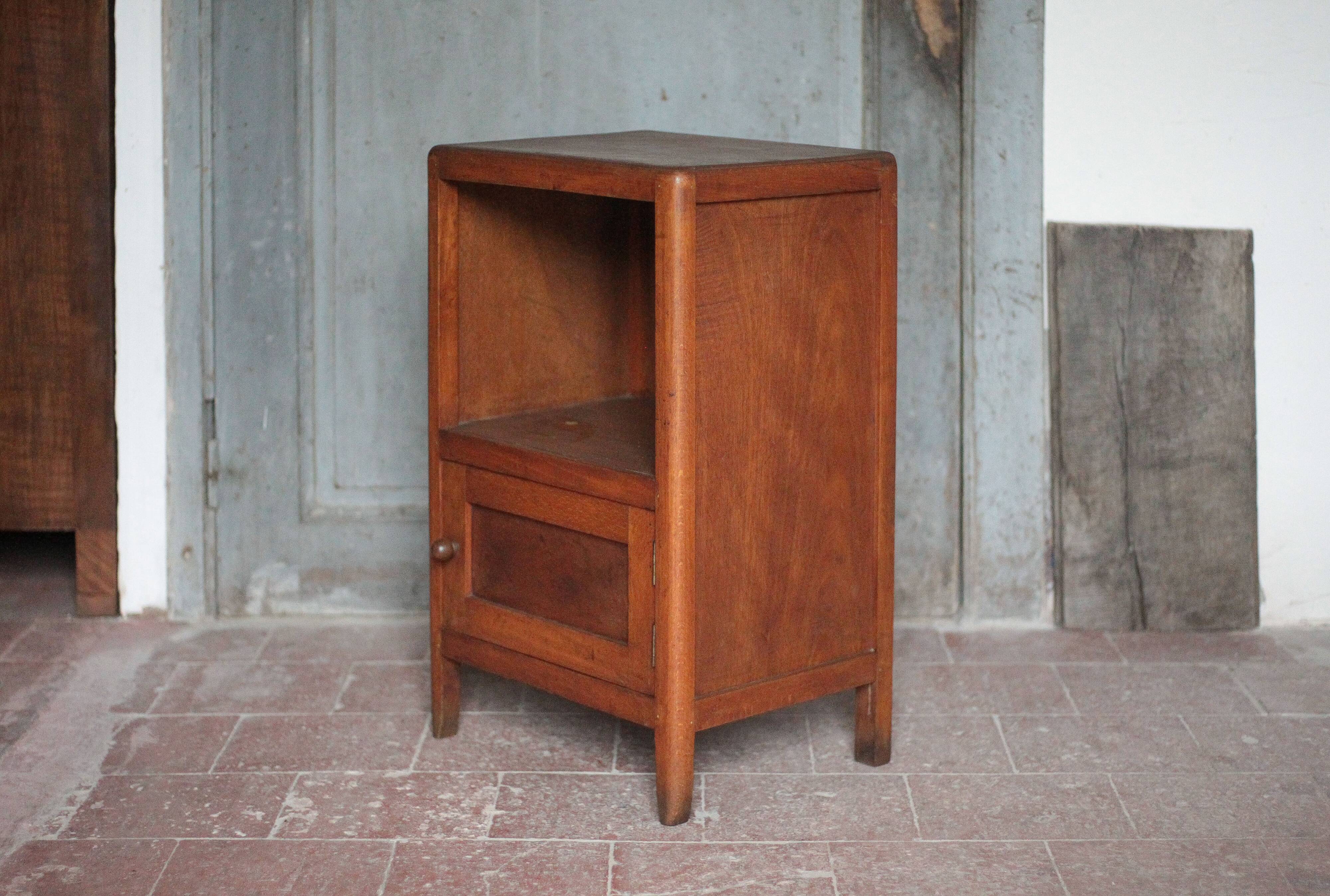 Wooden bedside table with compartment, reconstruction period.