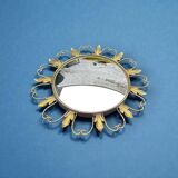 Circular gold metal mirror with floral decoration – 1960s