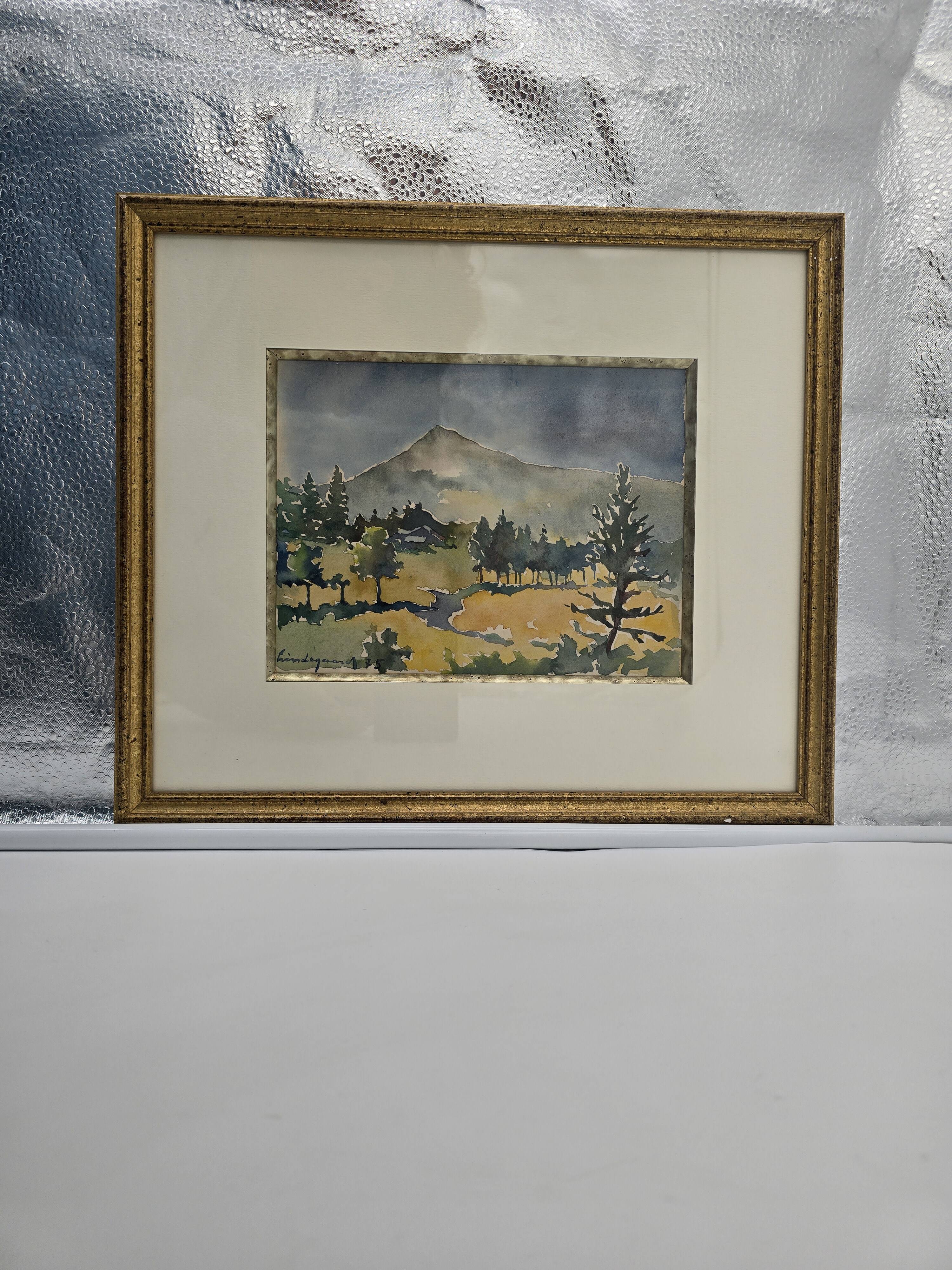 Framed watercolor by Henri Lindegaard 1975 - Forest and mountain landscape