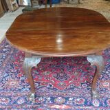 Nineteenth round table in carved mahogany with extension Ø 133 cm