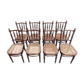 Suite de 8 chaises de bistrot en cannage FISCHEL