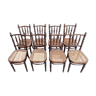 Suite de 8 chaises de bistrot en cannage FISCHEL