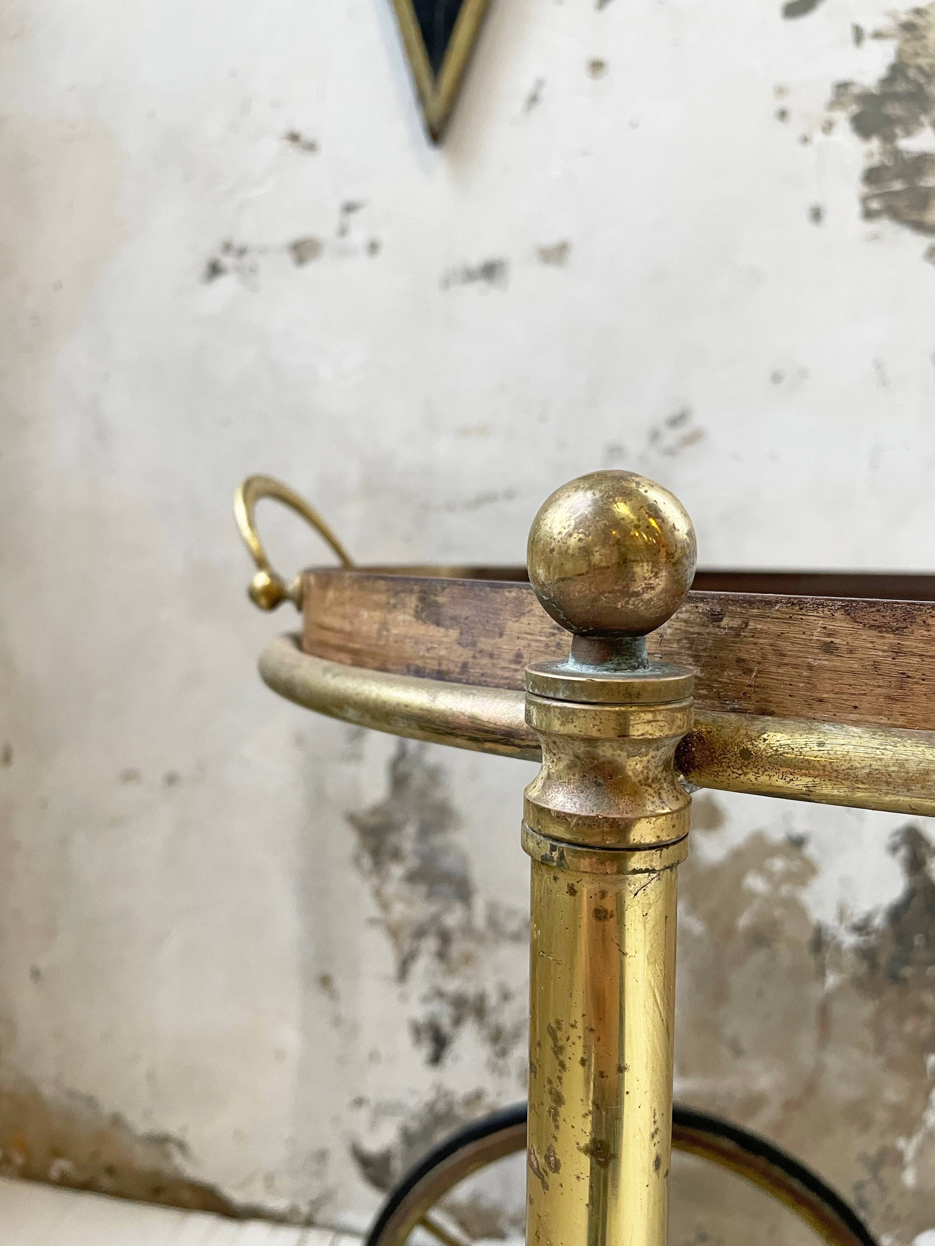 Cart serves brass bar