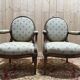 Pair of cabriole armchairs with medallion backs from the Louis XVI period, stamped OT.