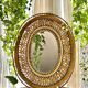 Oval mirror in rattan and wicker, 1970