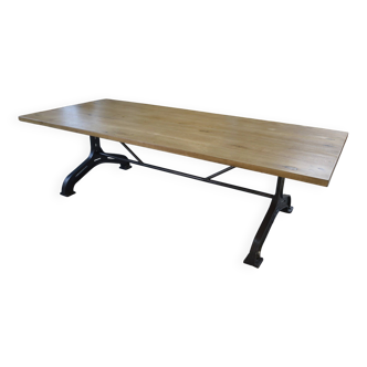 Large industrial table with cast iron "whale" legs and solid oak top