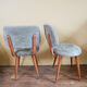 Pair of moumoute chairs with compass feet