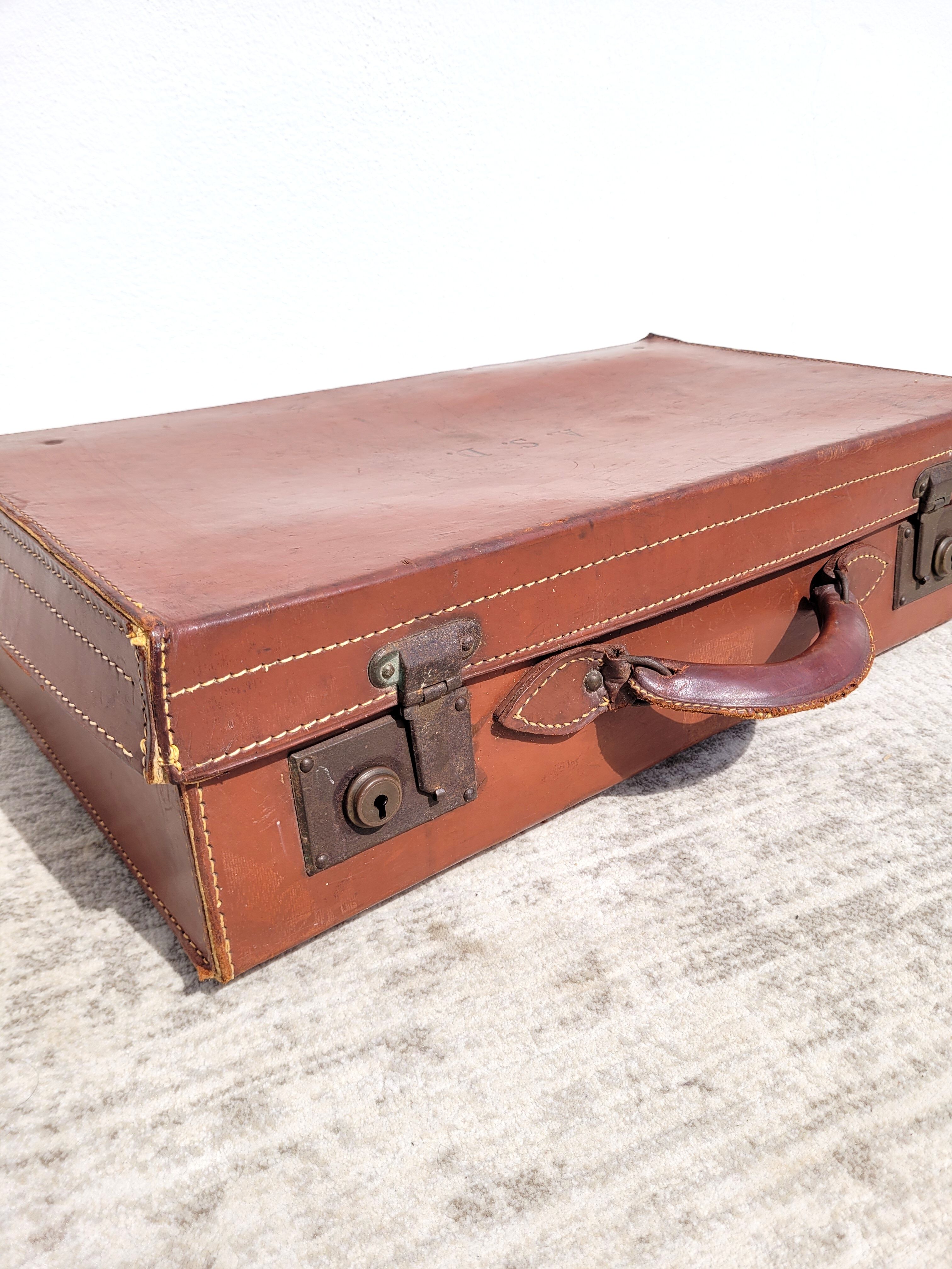 Old leather suitcase ASD