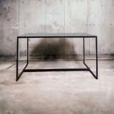 Coffee table in glass and iron