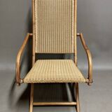 Foldable rattan armchair design 1960.