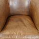 Fauteuil club en cuir de vachette couleur cognac clair