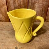 Vintage lemon yellow ceramic pitcher.