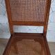 Art Deco caned chair with bronze ornaments.