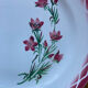 Flat plates Aude Sarreguemines with a rose flower design.