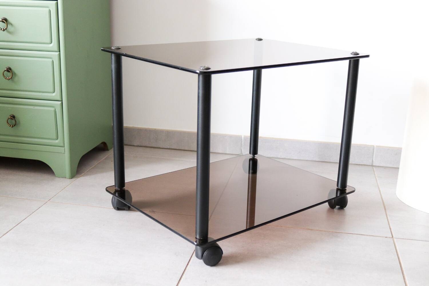 Erard tempered glass coffee table on wheels