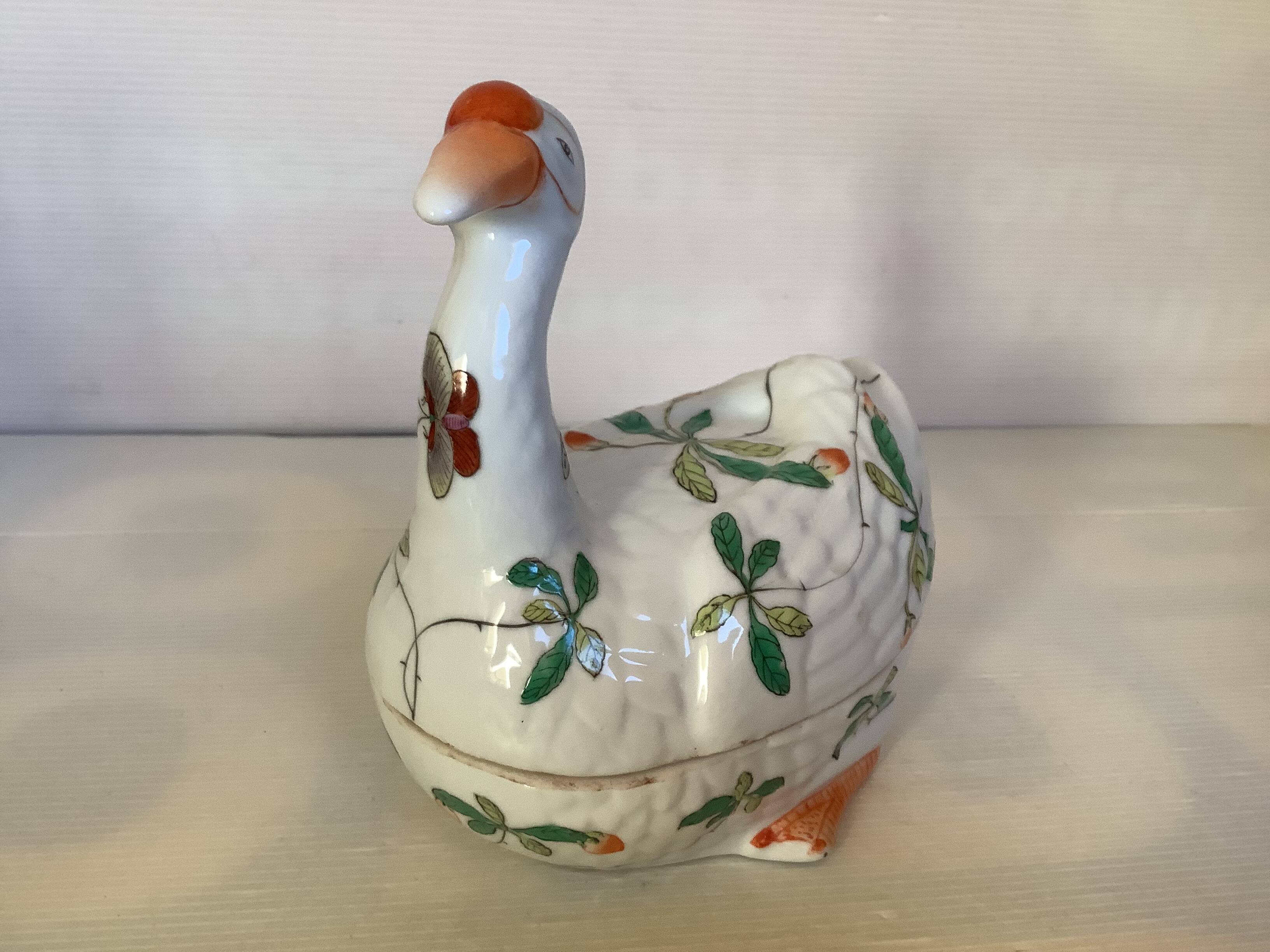 Large bird pocket emptier with butterflies and flowers.