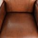 Sheepskin armchair in Art Deco style with wooden armrests