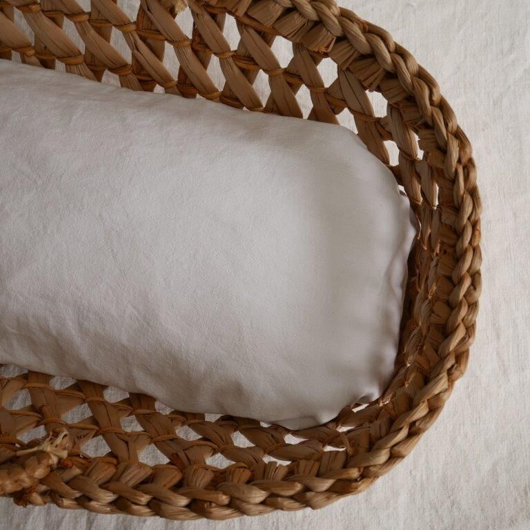 Doll bassinet with its bedding