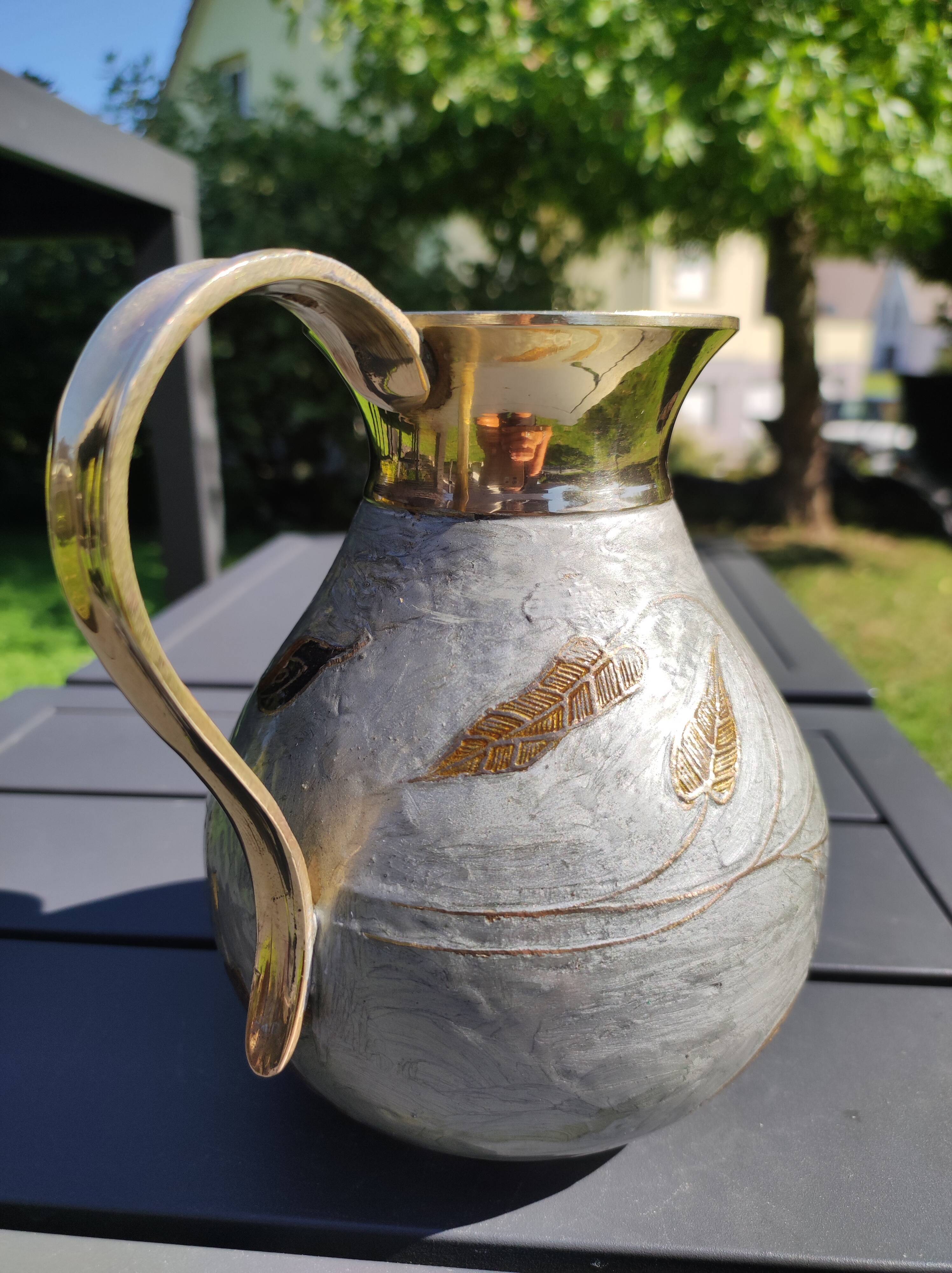 Decorative decanter in solid enamelled brass