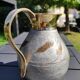 Decorative decanter in solid enamelled brass