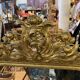 LARGE LOUIS XV STYLE ROCAILLE MIRROR IN GILT STUCCO FORAL DECOR ON PEDAL
