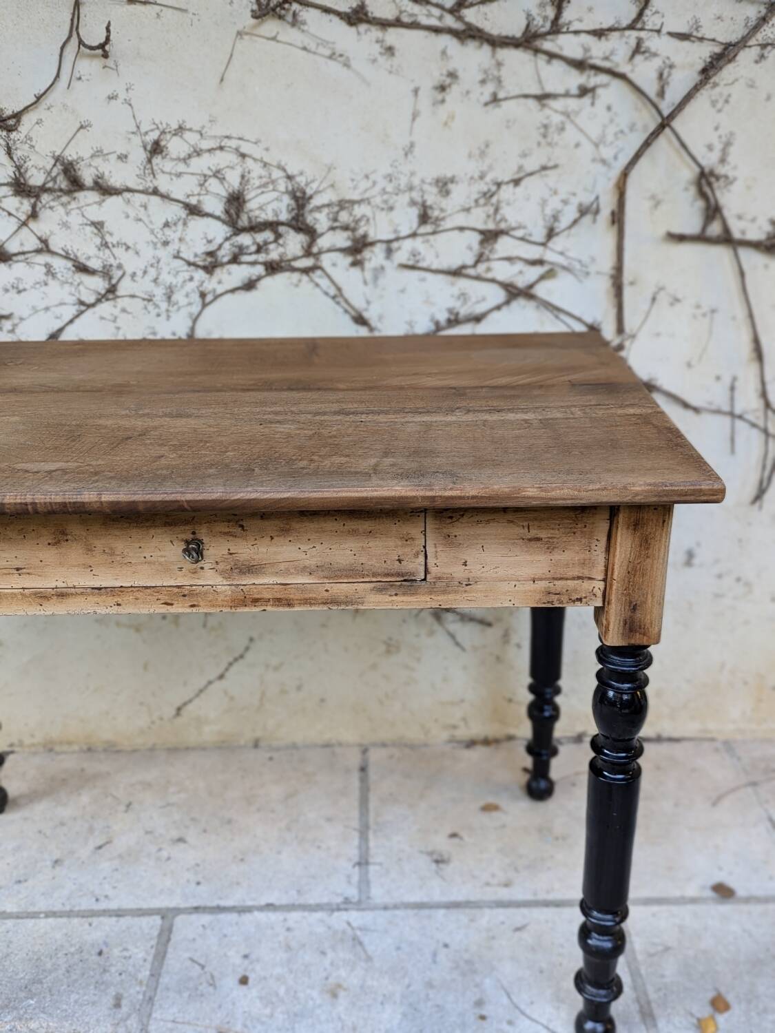 Solid wood desk, black base