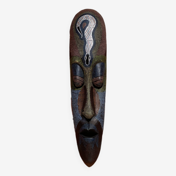 Wooden wall mask.