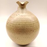 Vintage speckled brown stoneware pitcher in the shape of a ball