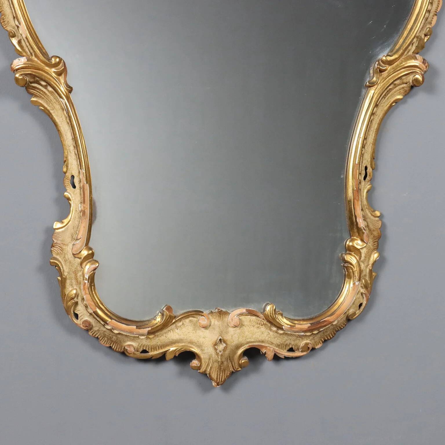 Antique baroque-style mirror in carved wood, Italy, 19th century.