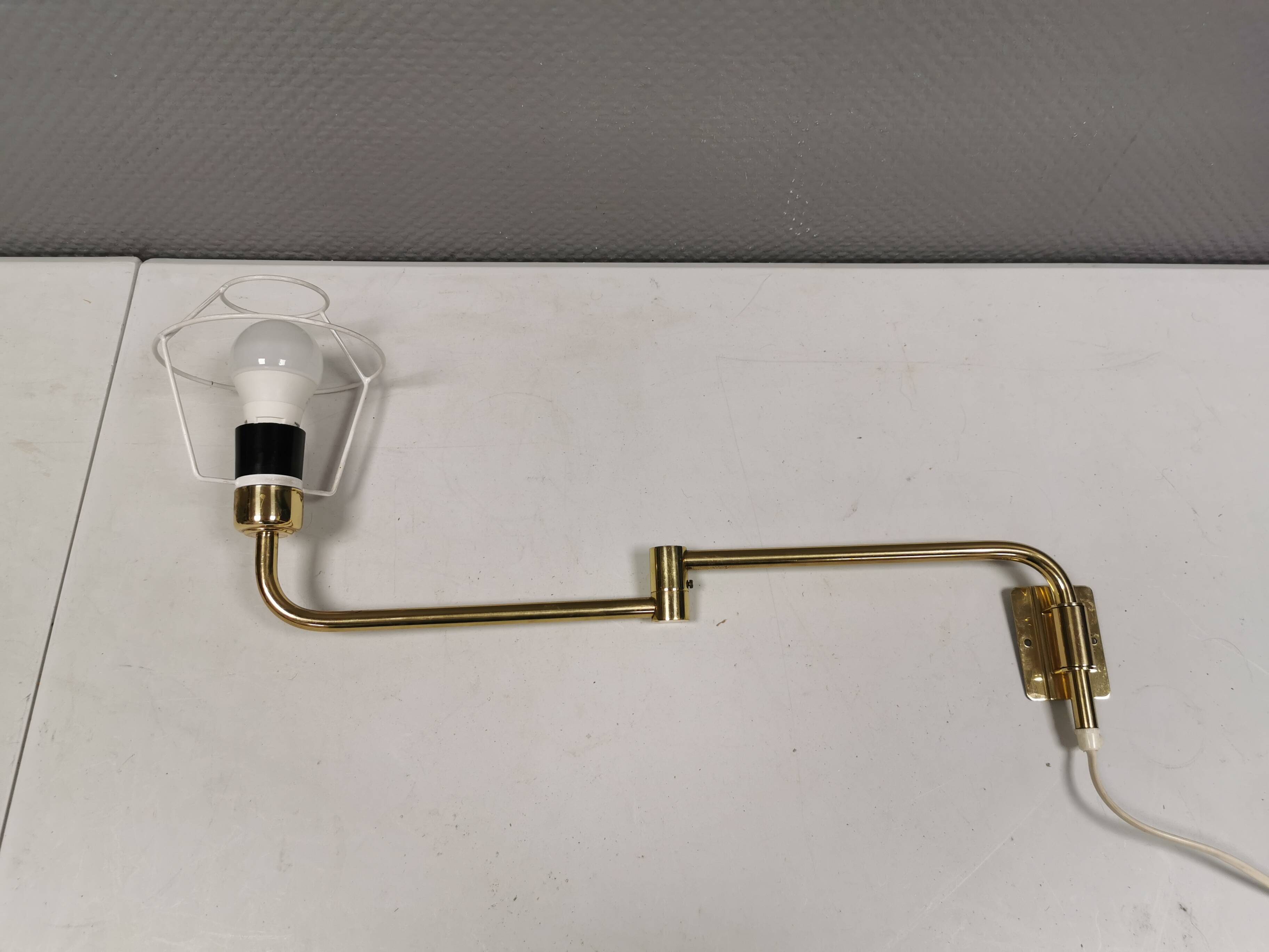 Danish “swing arm” wall lamp in brass by Lyskaer Lightning (LB) 1980s.