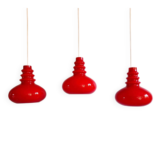 Trio of Space Age pendant lights in red opaline glass, Peill & Putzler, 1970