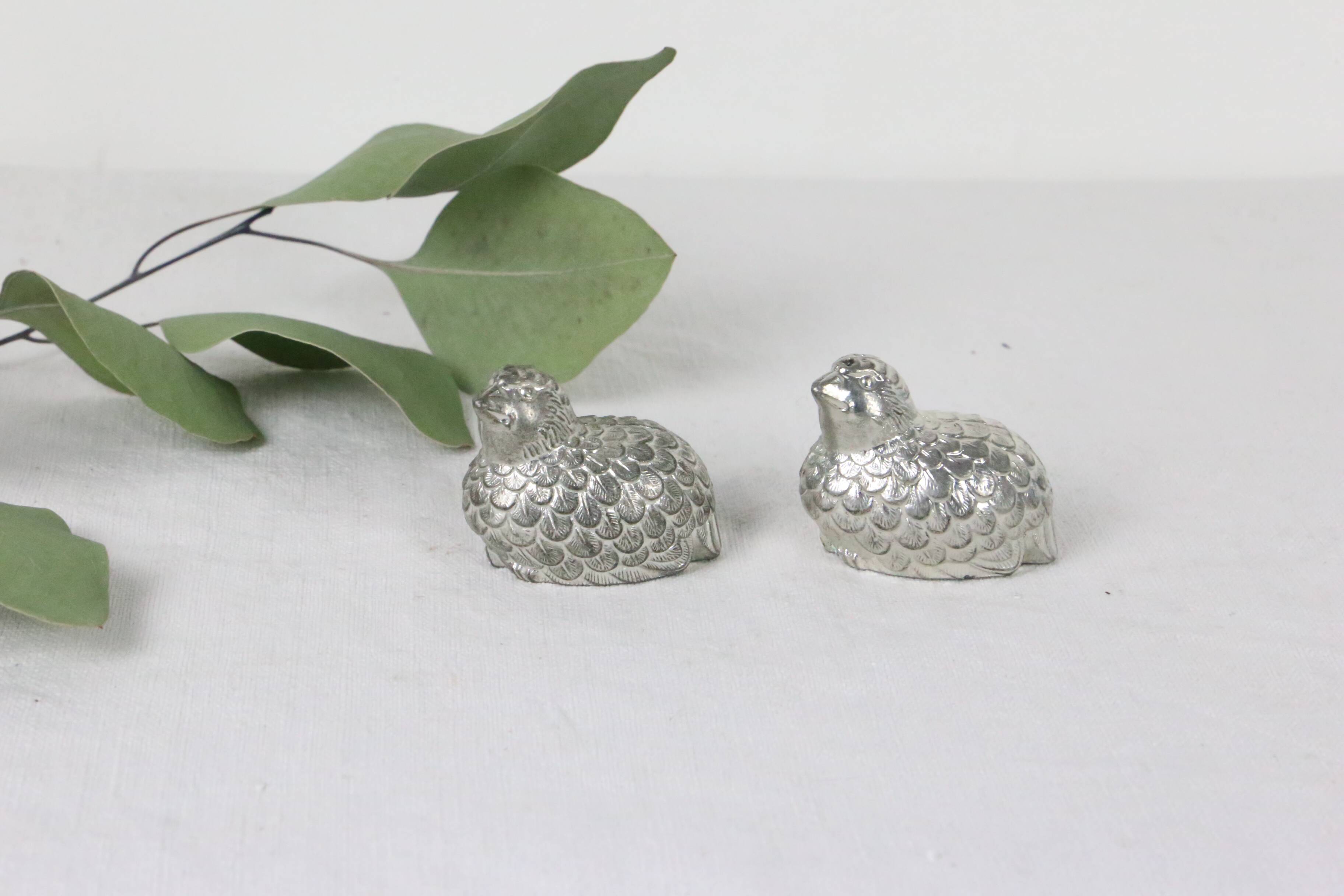 Metal salt and pepper shakers depicting two quails, 1970