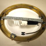 Brass "porthole" wall lamp