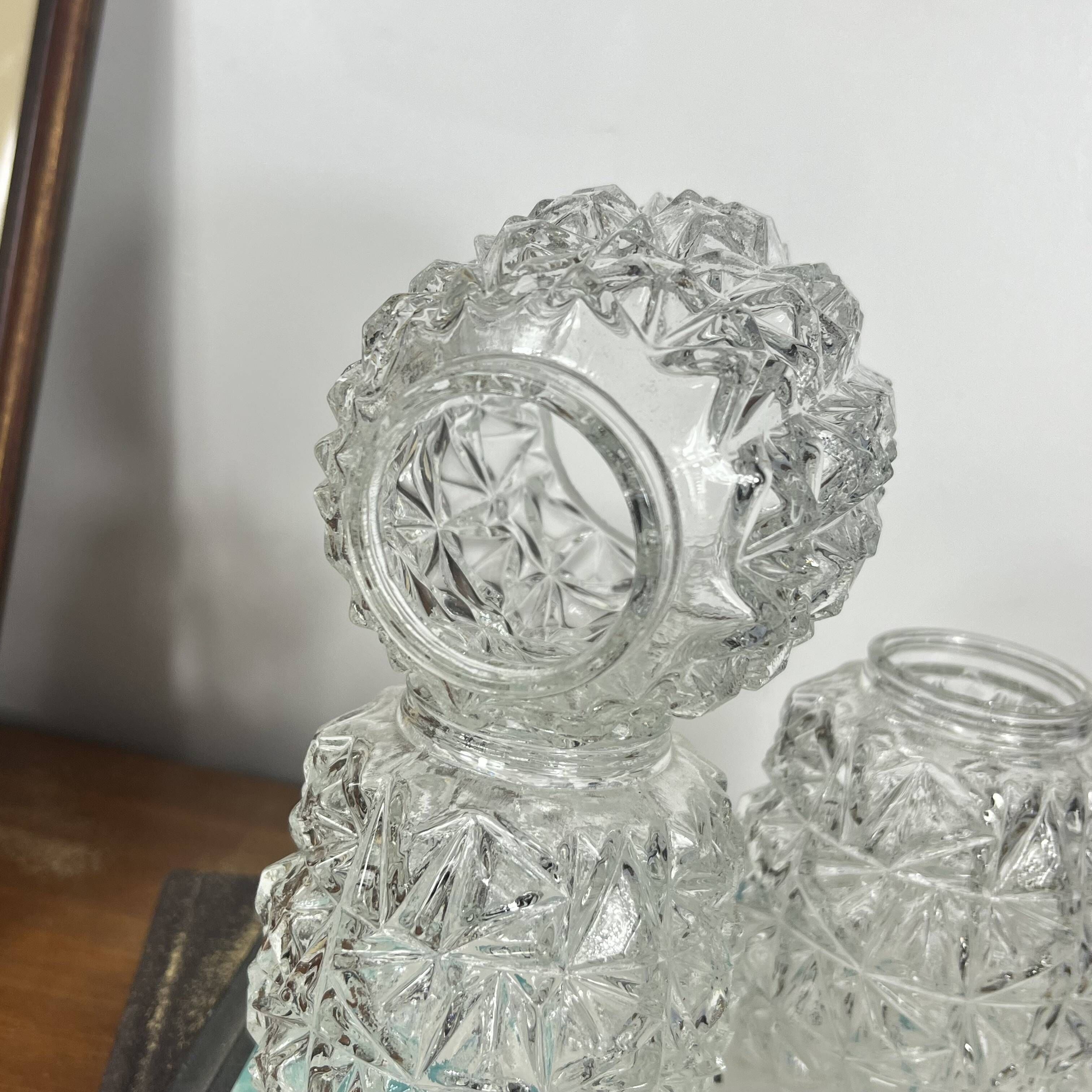 Set of 4 small vintage tulips in clear moulded glass.