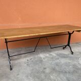 Large beech bistro coffee table and cast iron base French Paris bistro table