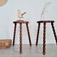 Pair of old wooden tripod stools