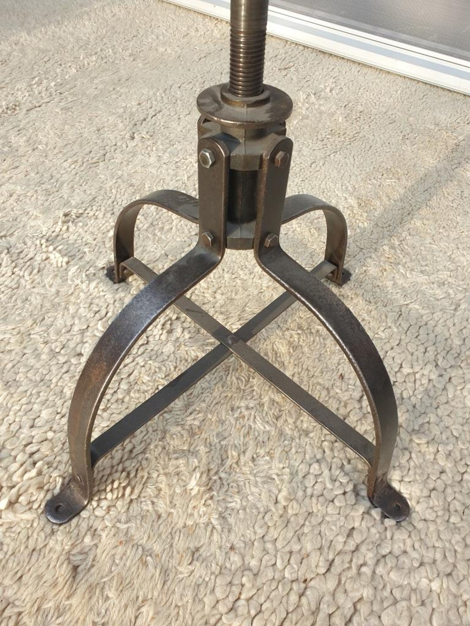 Bienaise stool of the years 1935, model 203 with 4 flat iron cathedral legs joined by a