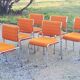 Set of 6 designer chairs from the 70s orange fabrics and chrome tubes