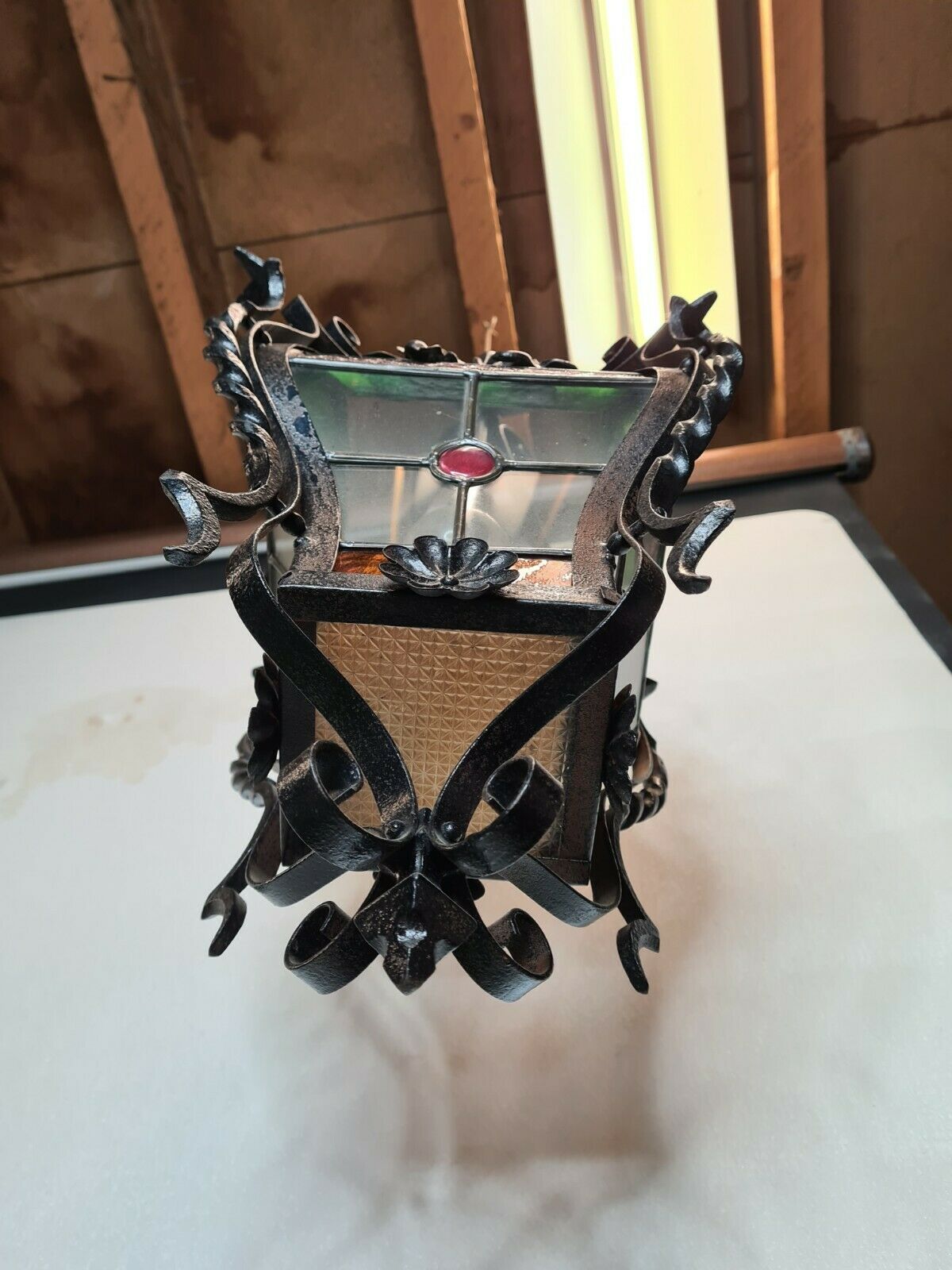 Wrought iron lantern with stained glass