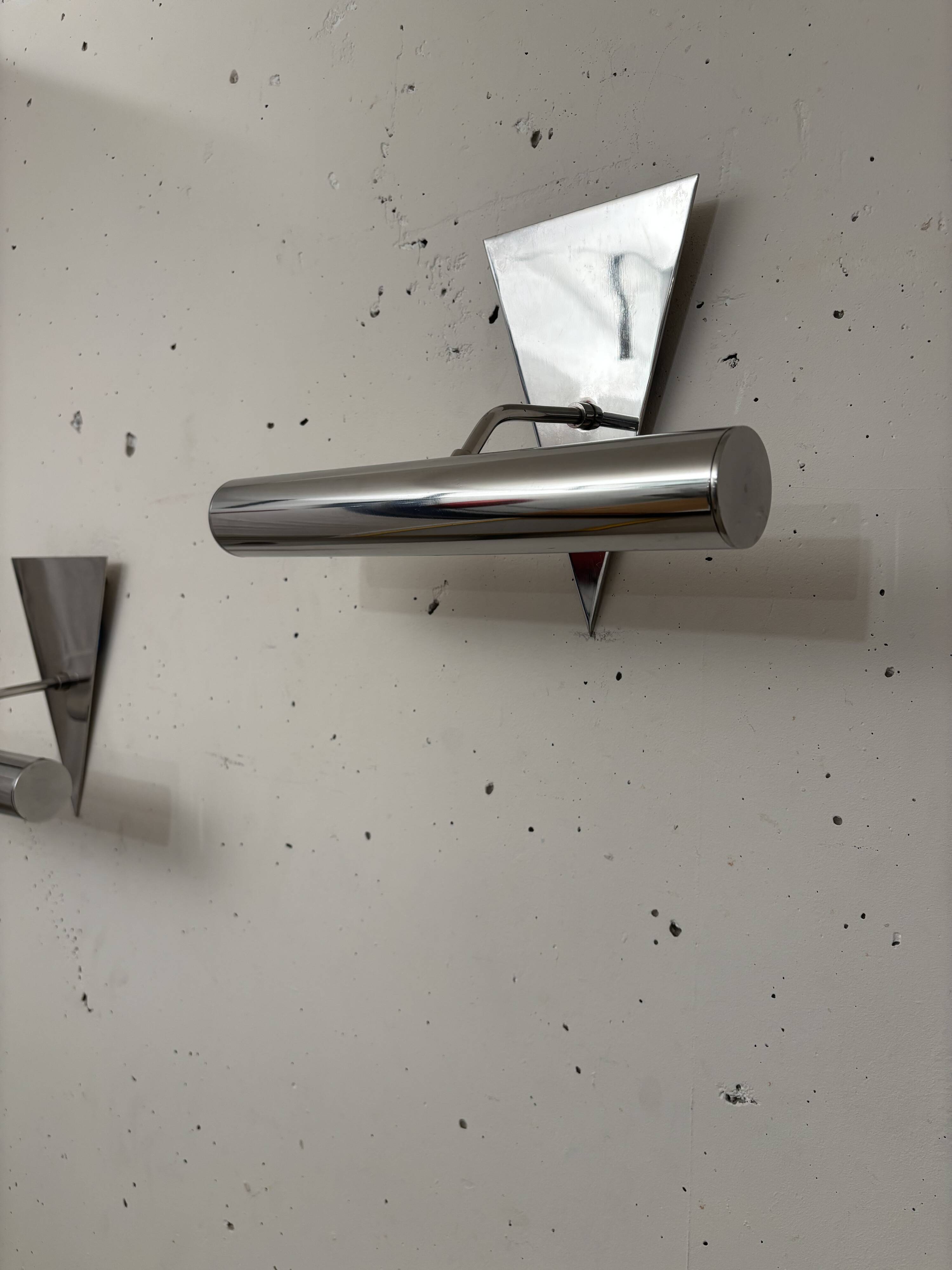 Pair of stainless steel wall lights 1980