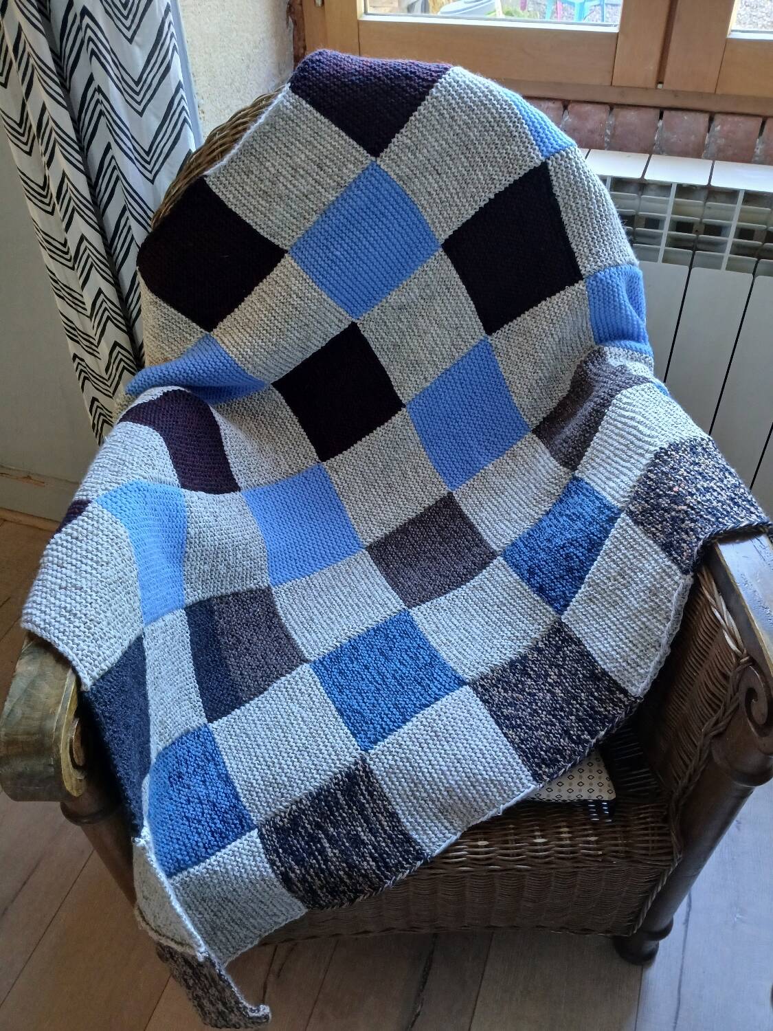 Hand knitted patchwork plaid