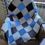 Hand knitted patchwork plaid