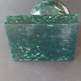 Design bookends in fractal resin with watchmaking inclusions.