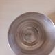 Silver-plated metal tumbler.
