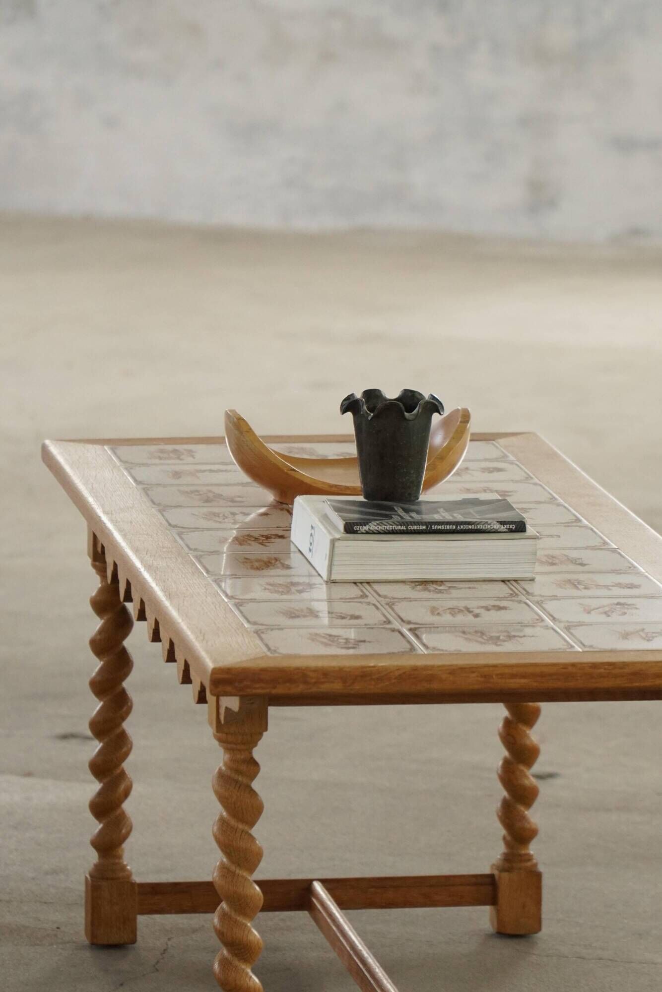 Mid-century modern Danish coffee table in oak with a ceramic top, 1950s.