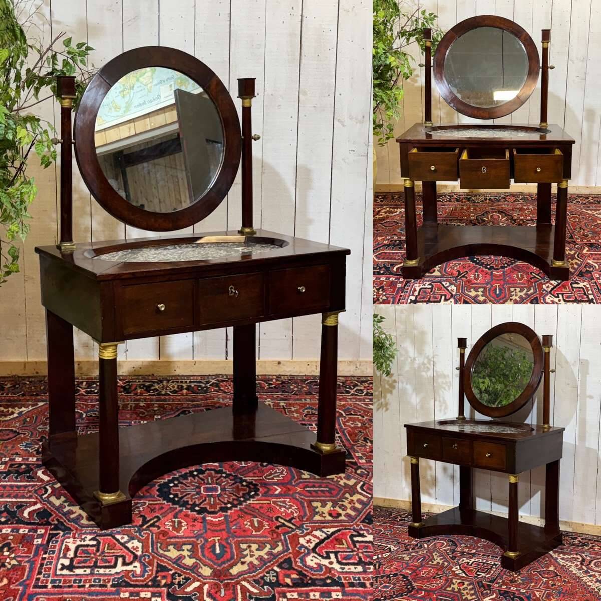 Empire hairdresser from the 19th century in mahogany with a marble top.