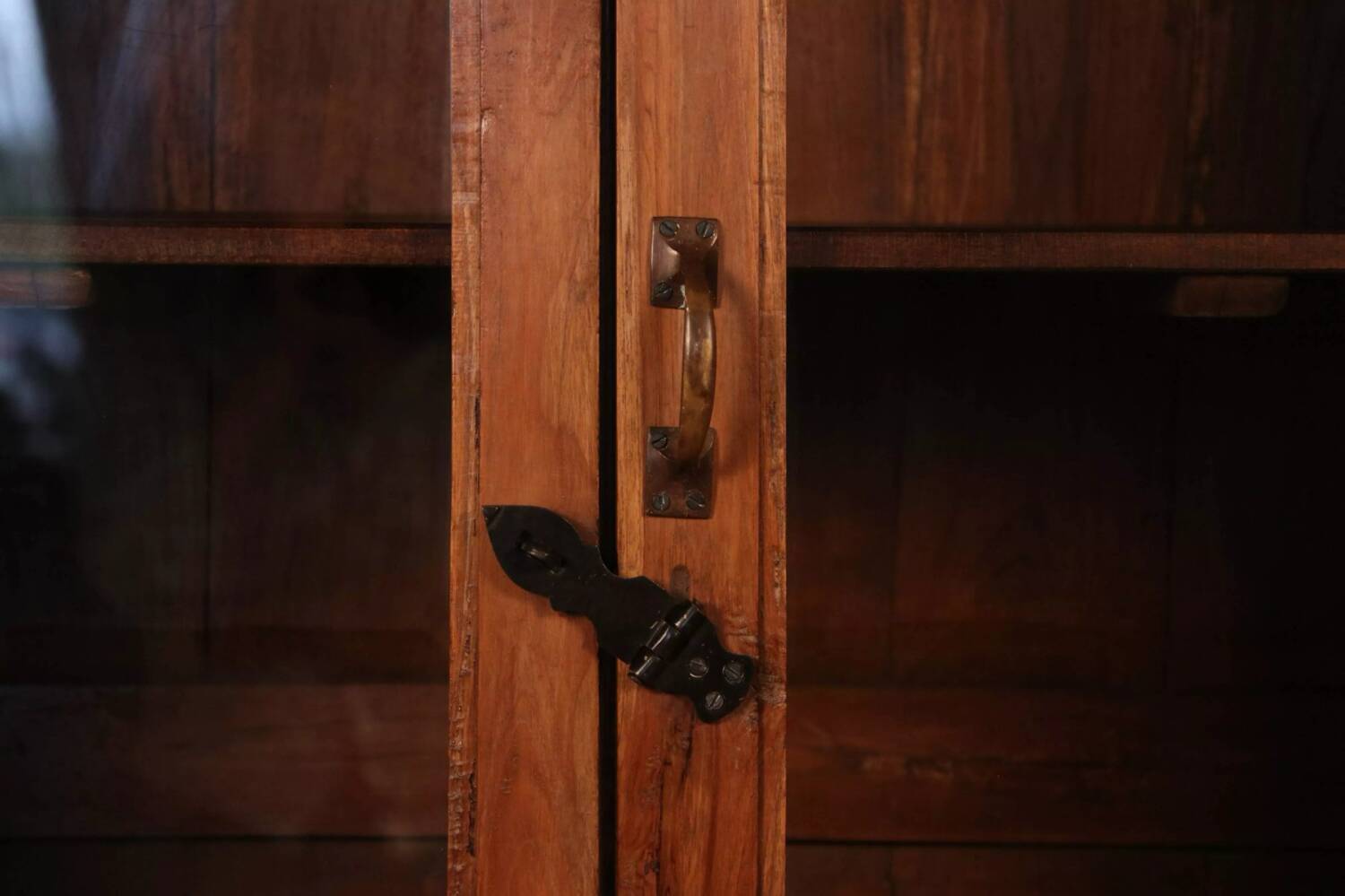 Antique Art Deco display cabinet in Burmese teak.